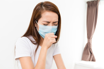 Woman feeling unwell at home