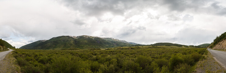 Fototapeta na wymiar Panorama with road and mountains of Altai