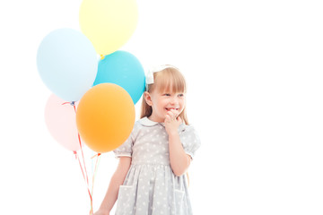 Fototapeta na wymiar Pleasant girl holding balloons 