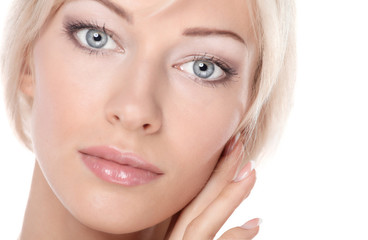 Fototapeta premium Close up portrait of beautiful young woman face. Isolated on