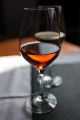 Closeup of two glasses of rose and white wine