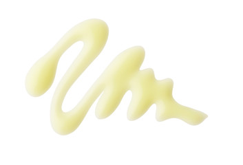 Yellow color cosmetic cream drop on background