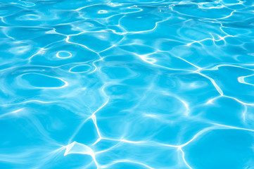 Blue water surface in swimming pool