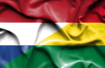 Waving flag of Bolivia and Netherlands