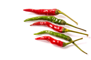 red an green Bird's Eye Chilli on white background (Capsicum ann