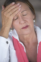 Woman with migraine headache closed eyes