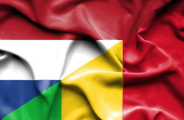 Waving flag of Mali and Netherlands