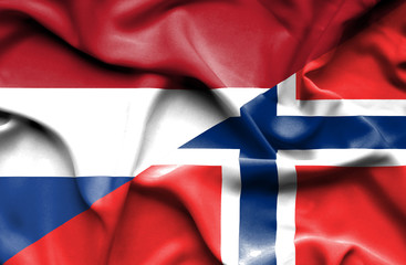 Waving flag of Norway and Netherlands