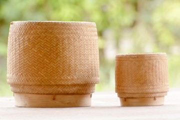 Kratip or sticky rice basket container that is the bamboo container for holding cooked glutinous rice.