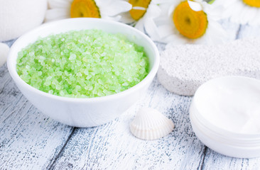 Spa salon with sea salt and daisy