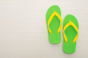 Flip flop on wooden background