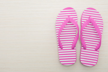 Flip flop on wooden background