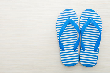 Flip flop on wooden background