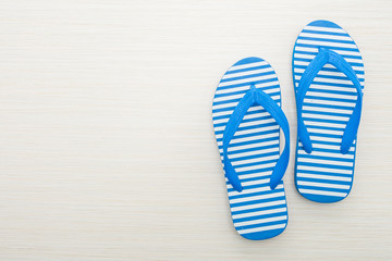 Flip flop on wooden background