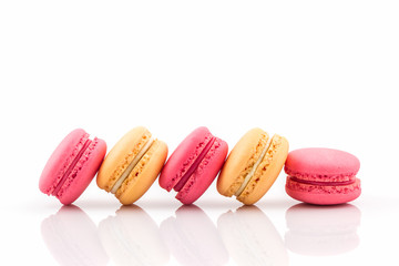 Sweet and colourful french macarons on white background, Dessert.