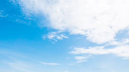 Naklejka na ściany i meble White cloud on blue sky background