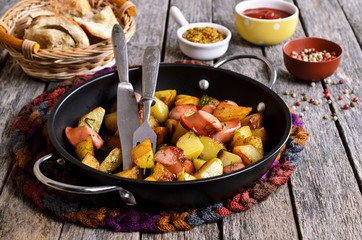 Potatoes with sausages