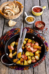 Potatoes with sausages