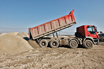 truck unloading sand