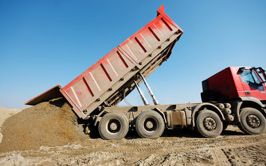 truck unloading sand