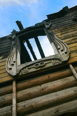 facade of the burned-down wooden house