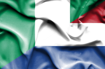 Fototapeta premium Waving flag of Netherlands and Nigeria