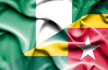 Waving flag of Togo and Nigeria
