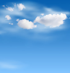 White clouds in the sky on blue background