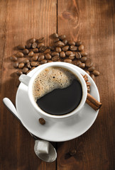 cup of coffee on wood