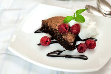 Chocolate cake with raspberry and mint