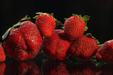 strawberries on a black background