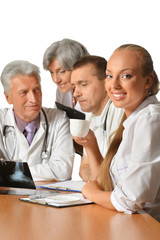 Group of doctors with laptop