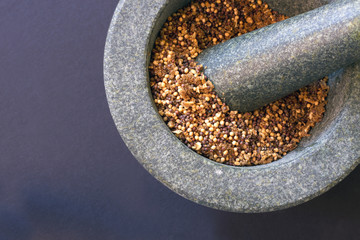 Pestle and mortar with mustard seed