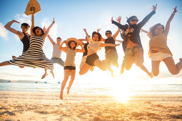 jumping at the beach