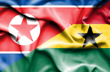 Waving flag of Ghana and North Korea
