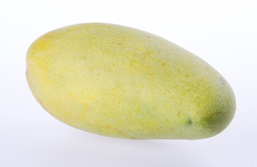 mangos or green yellow mangos on background.