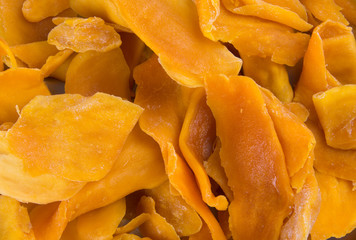 mango dry or dried mango slices on background.
