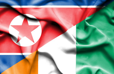 Waving flag of Ivory Coast and North Korea