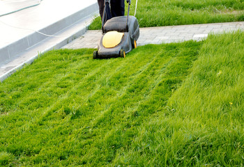man with a lawn mower