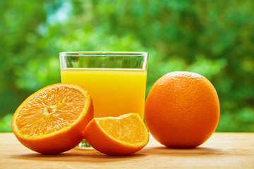 Orange and glass on the table