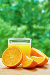 Orange and glass on the table
