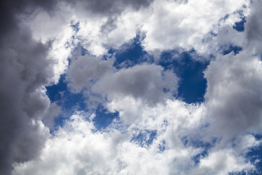 gray clouds against the blue sky