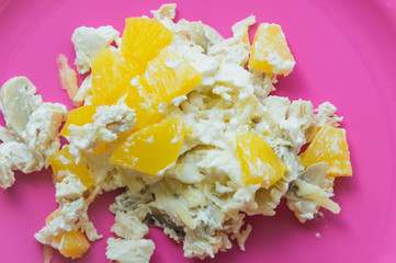 Salad mith chicken breasts, mushrooms, cheese and pineapple