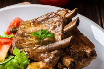 Pork spareribs served with silesian noodles and sauce