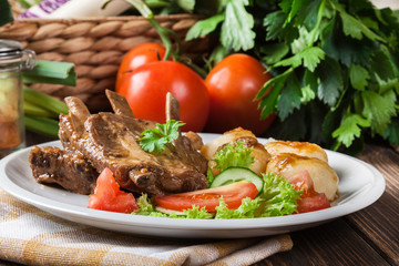 Pork spareribs served with silesian noodles and sauce