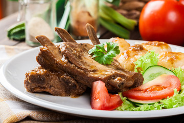 Pork spareribs served with silesian noodles and sauce