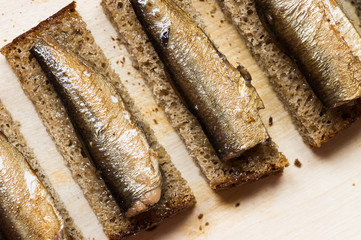 Bread with sprats closeup