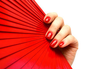 Red fan in hand