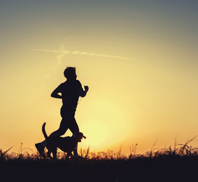 Night runner with dog