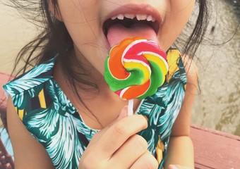 happy girl with candy cane  